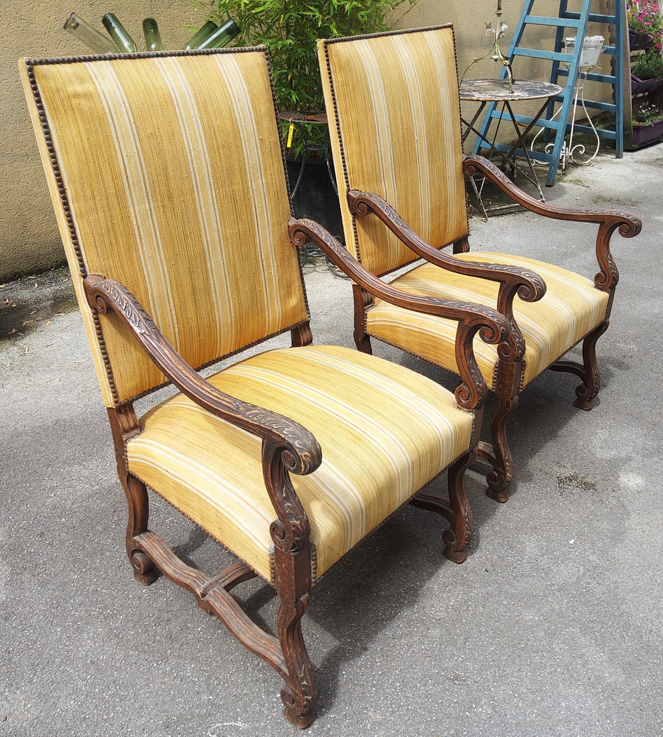 A pair of French Regence Armchairs